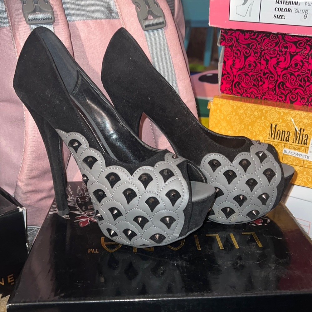 Black spiked heels